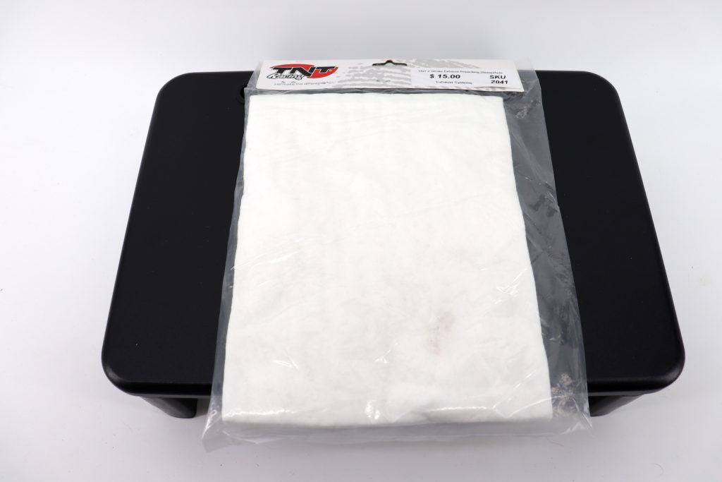 TNT 2 Stroke Exhaust Repacking 20cmx25cm Winnipeg's only expert scooter tuning shop Scooterdoc